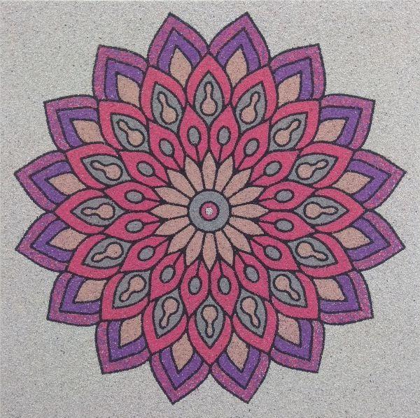 Mandala sand art kit design with intricate colorful patterns.