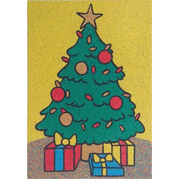 Karifa homokkép with decorated Christmas tree and colorful presents.